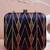   printed black golden geometric clutch bag for women with detachable strap