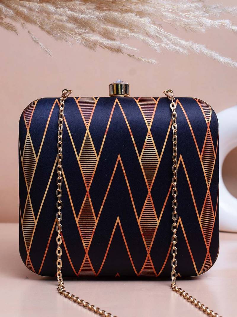   printed black golden geometric clutch bag for women with detachable strap