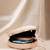   ivory based minimal embroidery clutch bag for women with detachble strap
