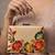   printed gold floral clutch bag for women with detachable strap