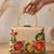   printed gold floral clutch bag for women with detachable strap