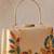   printed gold floral clutch bag for women with detachable strap