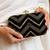  elegant black velvet embroidered clutch