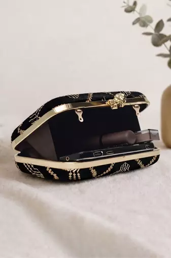  elegant black velvet embroidered clutch