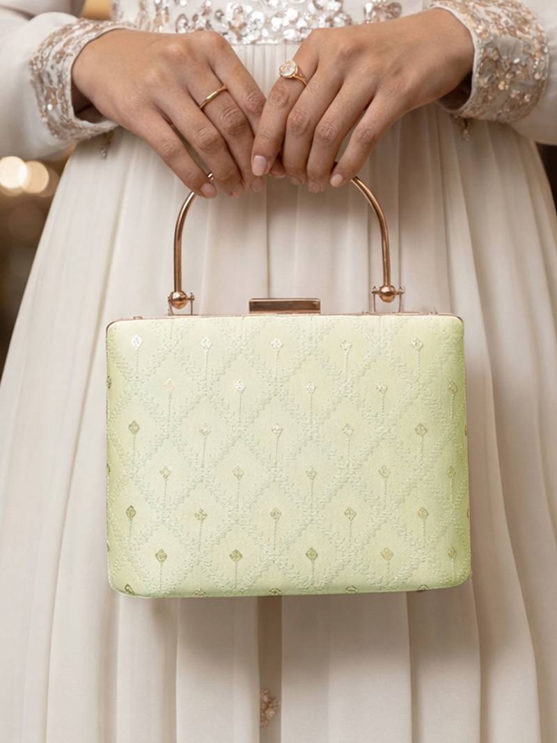  pista green based threadwork pattern embroidery clutch
