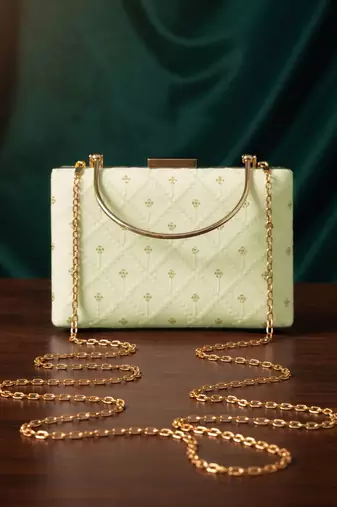  pista green based threadwork pattern embroidery clutch