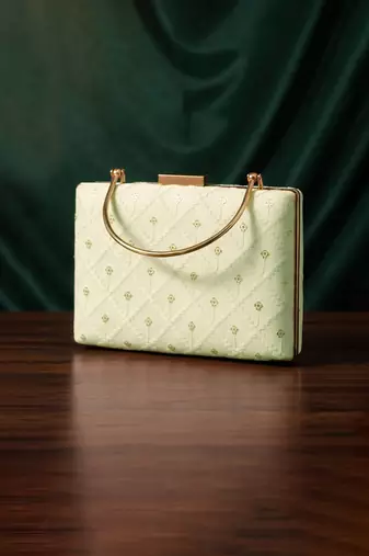  pista green based threadwork pattern embroidery clutch