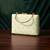  pista green based threadwork pattern embroidery clutch