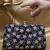  black based white floral embroidery clutch