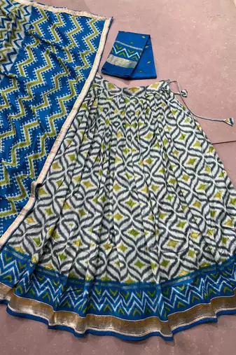 Women Ikat Printed Tasar Silk Lehenga Choli Set with Foil Print Detailing