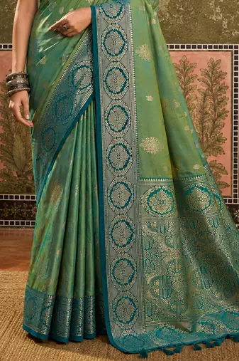 sangam prints green soft silk blend woven work traditional saree