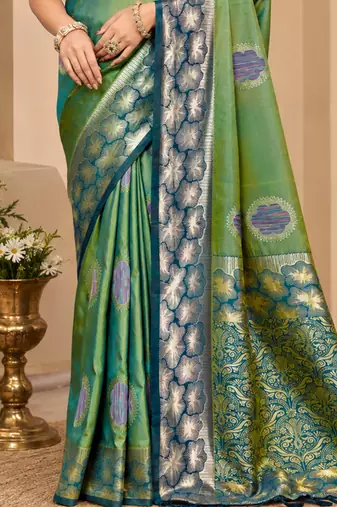 sangam prints green soft silk blend woven work traditional saree