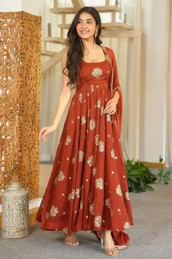 Rust orange embroidered flared anarkali gown with dupatta