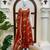 Rust orange embroidered flared anarkali gown with dupatta