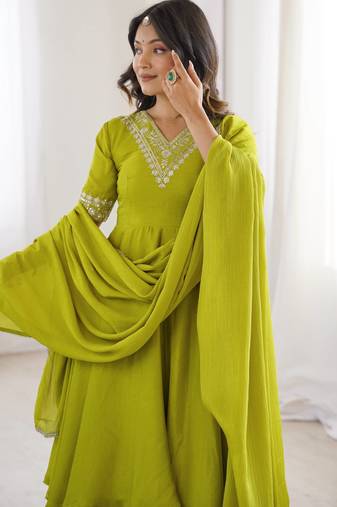 Women green silk embroidery work detailing kurta set with dupatta