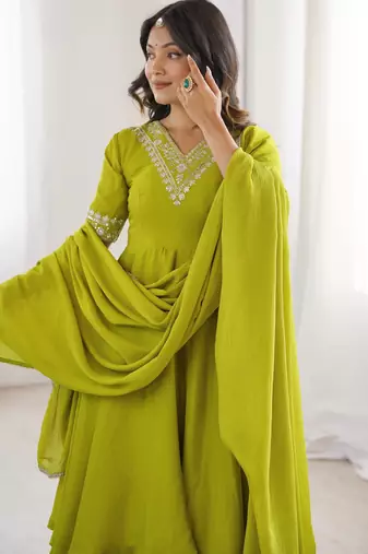 Women green silk embroidery work detailing kurta set with dupatta