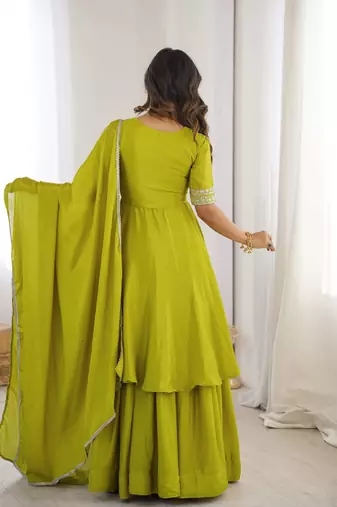 Women green silk embroidery work detailing kurta set with dupatta