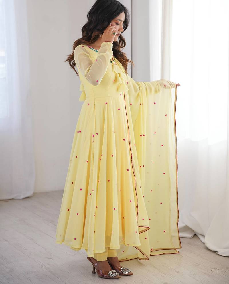 Women yellow gorgette embroidery work detailing kurta set with dupatta
