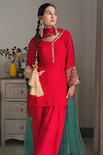 Women red silk embroidery work detailing kurta set with dupatta