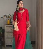 Women red silk embroidery work detailing kurta set with dupatta