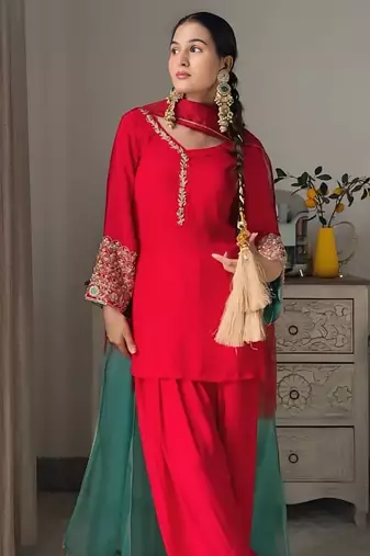 Women red silk embroidery work detailing kurta set with dupatta