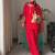 Women red silk embroidery work detailing kurta set with dupatta