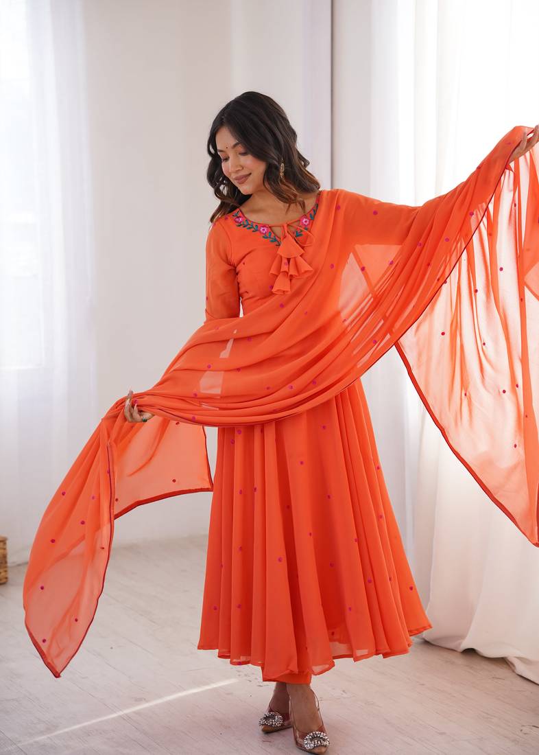 Women orange gorgette embroidery work detailing kurta set with dupatta