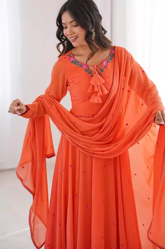 Women orange gorgette embroidery work detailing kurta set with dupatta
