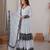 Women white gorgette embroidery work detailing kurta set with dupatta