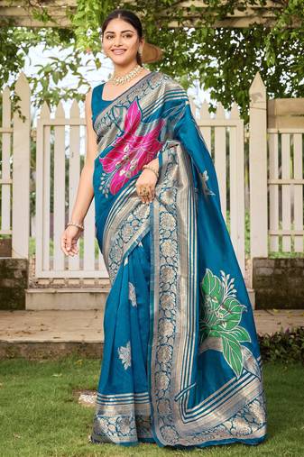 Women's blue jacquard silk blend saree with zari floral border festive wear