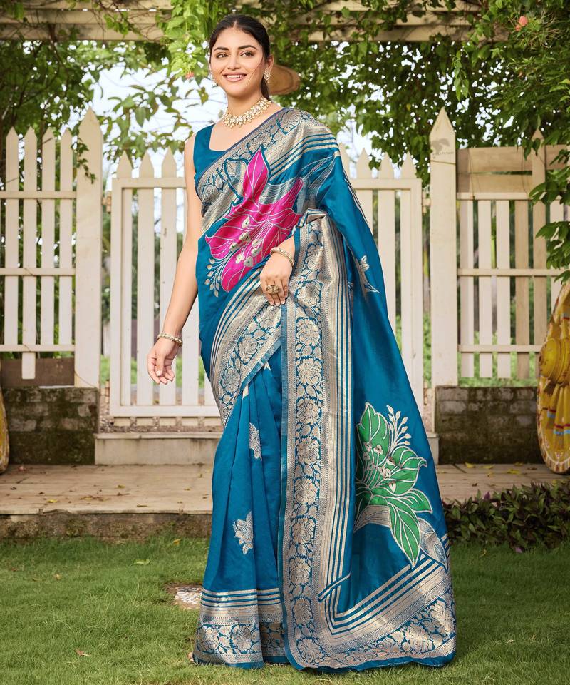 Women's blue jacquard silk blend saree with zari floral border festive wear