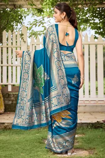 Women's blue jacquard silk blend saree with zari floral border festive wear
