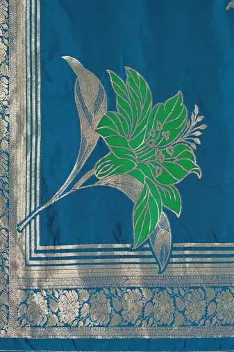 Women's blue jacquard silk blend saree with zari floral border festive wear