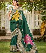 Women's green jacquard silk blend saree with zari floral border festive