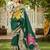 Women's green jacquard silk blend saree with zari floral border festive