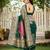 Women's green jacquard silk blend saree with zari floral border festive