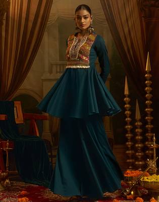 Teal blue mul cotton set with a long-sleeve flared peplum top, mirror-work embroidered yoke. 4