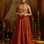 Elevate festive style with this rust orange gown featuring intricate mirror and thread embroidery.