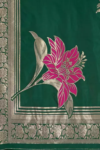 Women's green jacquard silk blend saree with zari floral border festive