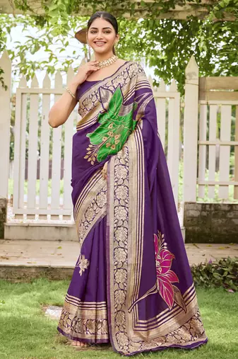 Women's purple jacquard silk blend saree with zari floral border festive