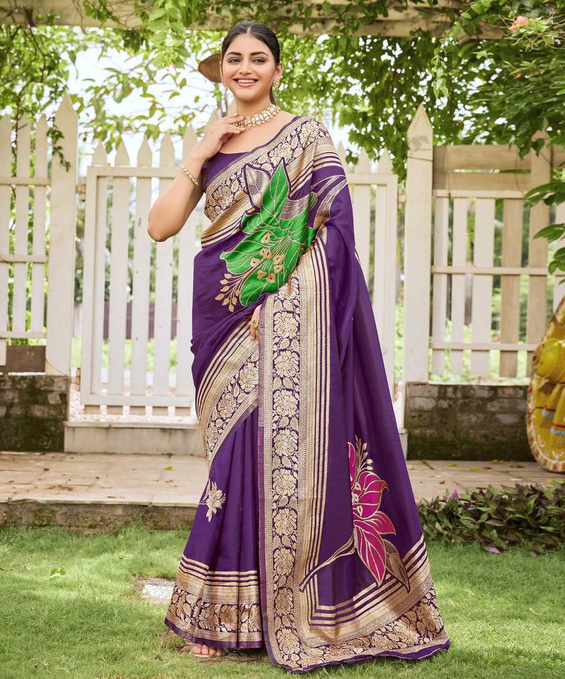 Women's purple jacquard silk blend saree with zari floral border festive