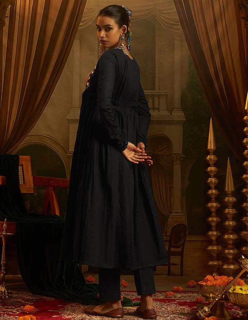 Black mul cotton anarkali gown featuring intricate handwork geometric embroidery, colourful yoke detailing.
