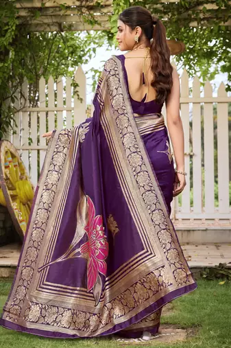 Women's purple jacquard silk blend saree with zari floral border festive