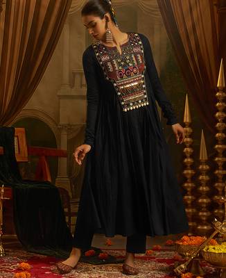 Black mul cotton anarkali gown featuring intricate handwork geometric embroidery, colourful yoke detailing. 2