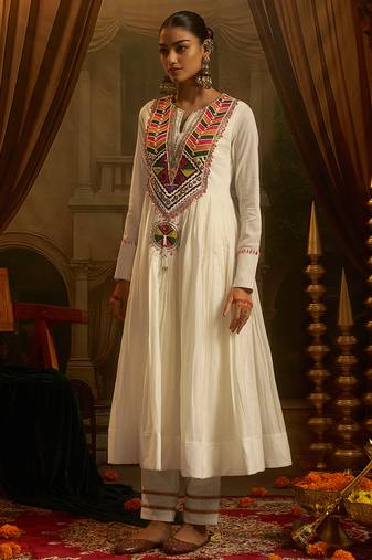 White mul cotton anarkali set featuring intricate multicolour hand embroidery.