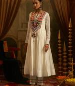 White mul cotton anarkali set featuring intricate multicolour hand embroidery.