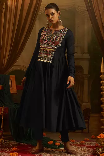 Black mul cotton anarkali gown featuring intricate handwork geometric embroidery, colourful yoke detailing.