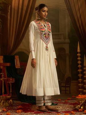White mul cotton anarkali set featuring intricate multicolour hand embroidery. 2