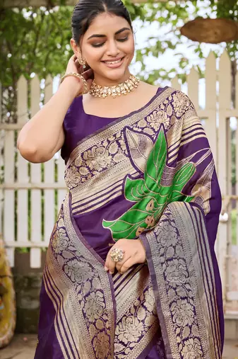 Women's purple jacquard silk blend saree with zari floral border festive