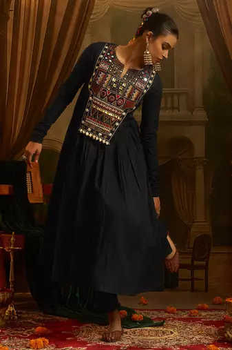 Black mul cotton anarkali gown featuring intricate handwork geometric embroidery, colourful yoke detailing.